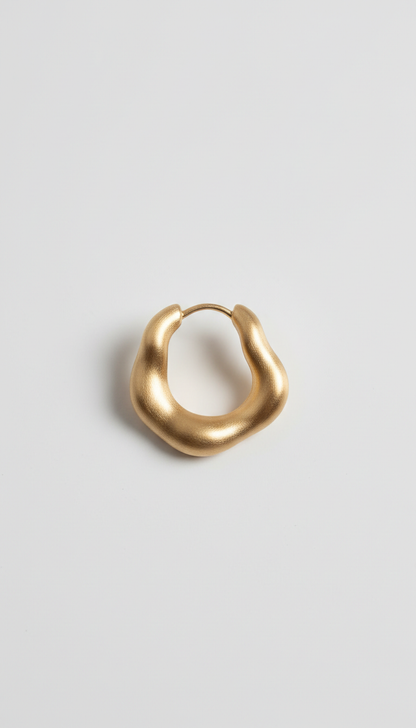 Brushed gold sculptural hoop earrings, Default angle: macro 3/4 view focusing on key textural features of each piece;...