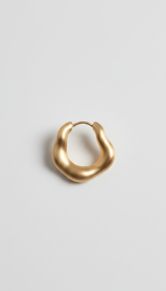 Brushed gold sculptural hoop earrings, Default angle: macro 3/4 view focusing on key textural features of each piece;...